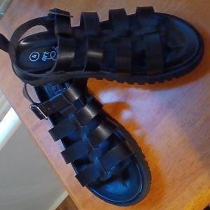 Black goth chunky sandals in size 4 girls, fits a women's size 6.5 perfectly.
